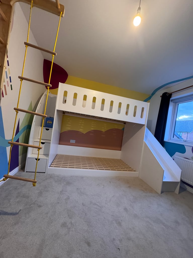 low bunk bed with stairs and slide front view