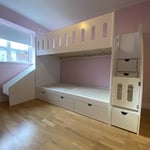 Slide bunk bed