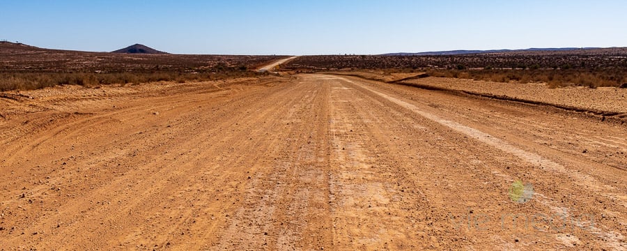 Driving towards Border Down's along Jack Absalom's famed Sturt's Steps Touring Route, Broken Hill to Cameron Corner, Outback NSW, Australia
