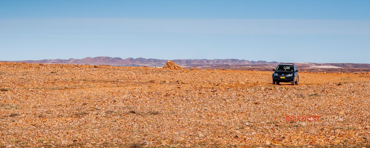 Simon Bayliss in his iconic Suzuki Grand Vitara, driving Jack Absalom's Sturt's Steps from Broken Hill to Cameron Corner, Outback NSW, Australia.