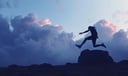 Jumping dream symbol meaning - Symbol of transcendence, risk, and spiritual ascent.