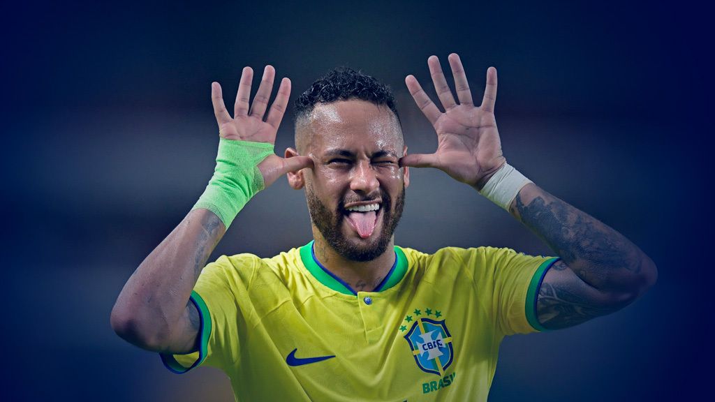 A visibly Neymar Jr makin a fun gesture with his fingers at the side of his face