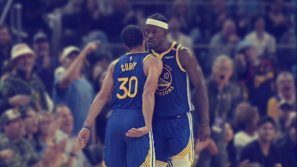 Steph Curry celebrating with Jimmy Butler after a positive play with the Golden State Warriors