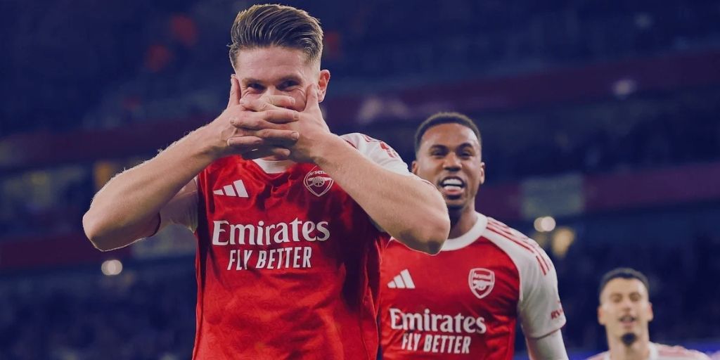 Arsenal player celebrating a goal in the Champions League