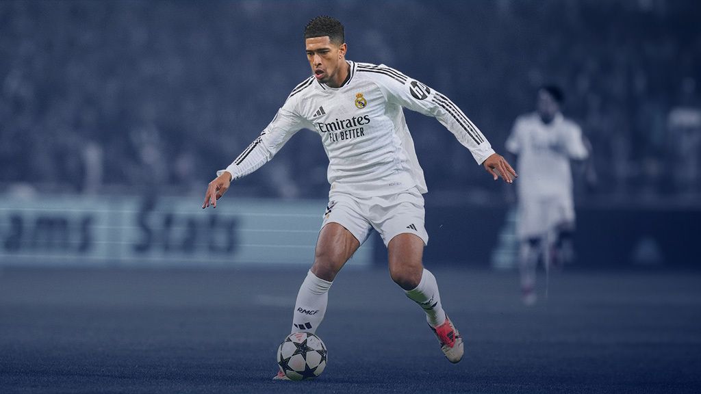 Jude Bellingham moving with a UCL  ball