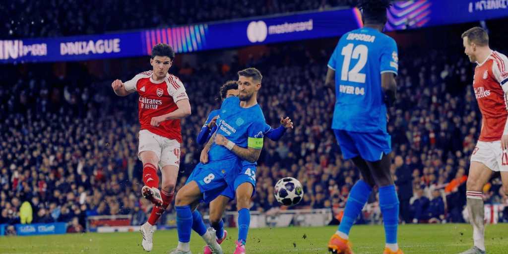 Declan Rice shoots at goal for Arsenal during UEFA Champions League quarter-final vs Sporting CP
