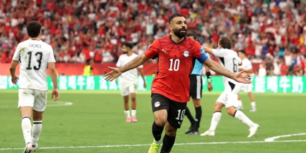 Mo Salah celebrates his World Cup 2026 goal with three New Zealand players and the referee in the background