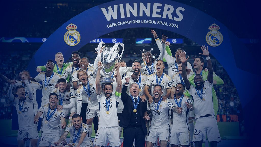 Real Madrid players and head coach celebrating their 2024 UCL win