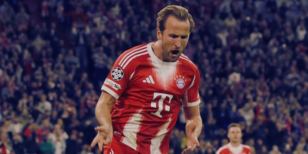 Harry Kane celebrating a goal in Bayern Munich's Champions League kit