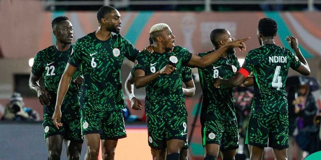 Nigerian squad celebrating with Victor Osimhen