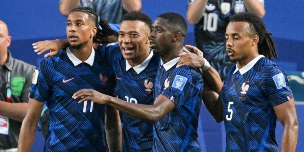 Dembele, Olise, Mbappe and Kounde celebrating goal for France