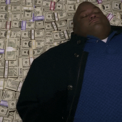 Huell Babineaux of Breaking Bad on a pile of money