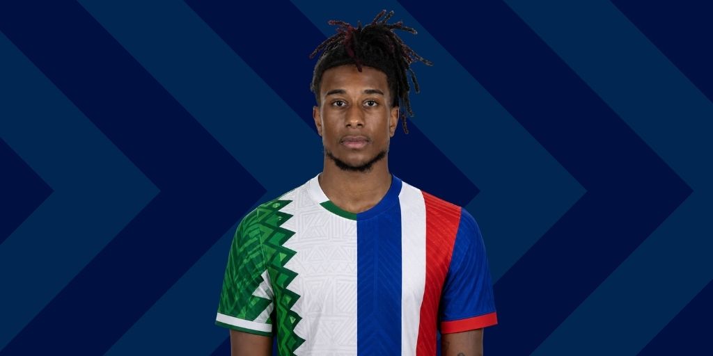 Michael Olise wearing a half-Nigeria, half-France jersey representing his dual heritage at the 2026 World Cup