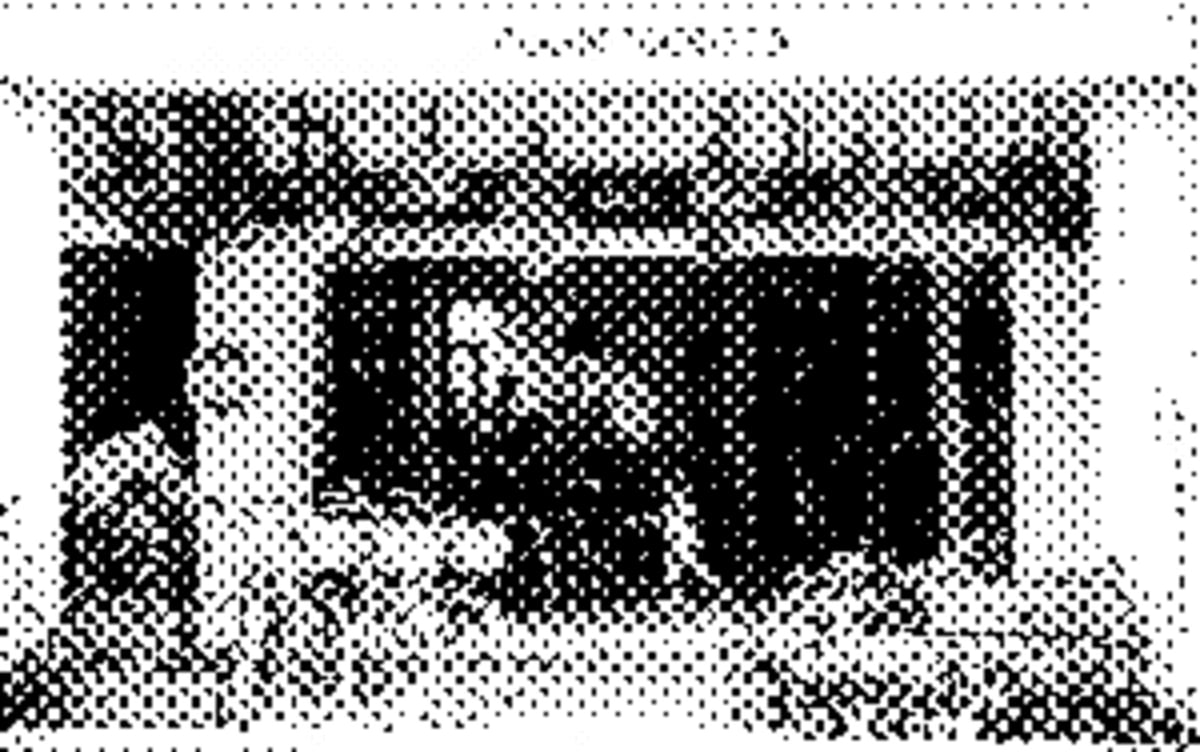 A neighbourhood bakery cafe with white walls, a long marble counter, rows of frosted cupcakes under glass, and a small espresso bar at the back