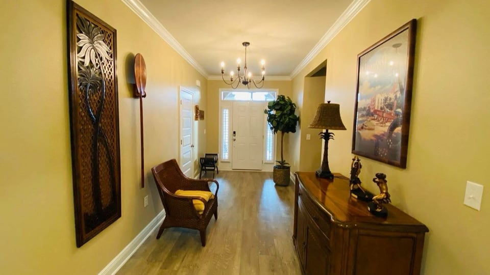 Drywall repair in progress in a Baldwin County home