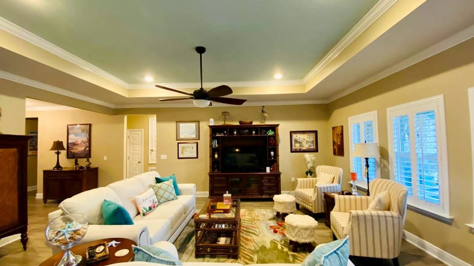 Professional interior painting project showing precise brushwork and clean lines