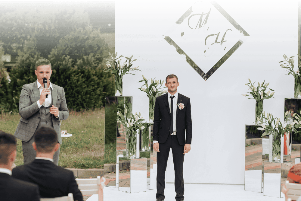 Wedding ceremony setting with initials backdrop, perfect for guests to use QR code and collect wedding photos.