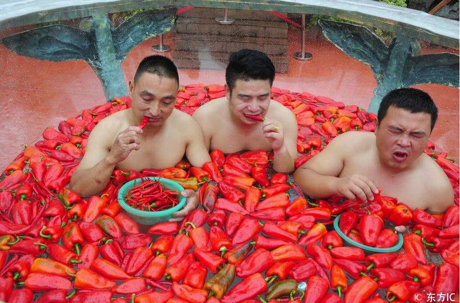 Feature image of Today in Chinese Culinary Oddities: Chili-Eating Hot Tub Contest, World’s Smallest Watermelon, World’s Largest Rice Paddy Painting