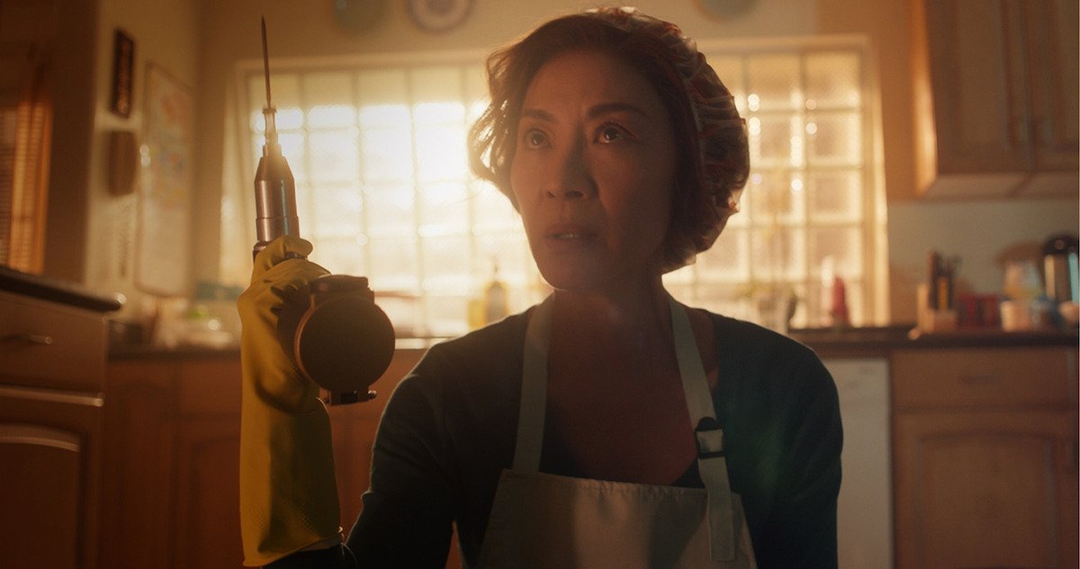 Feature image of Watch the Heart-Pumping Trailer for Michelle Yeoh’s “The Brothers Sun” on Netflix