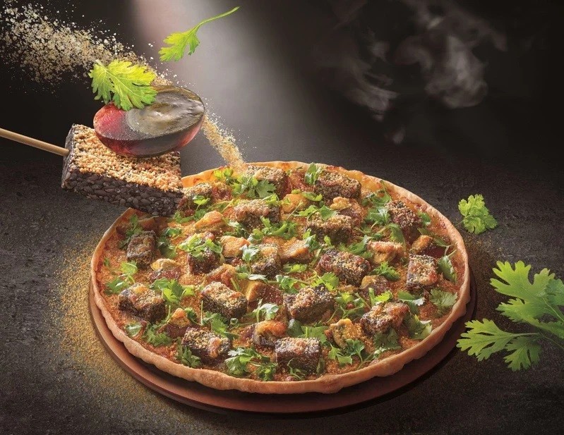 Taiwan Pizza Hut cilantro, pig's blood, century egg fusion pizza