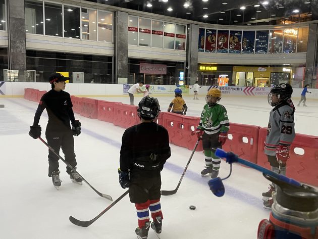 women ice hockey kids practice