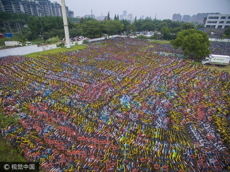 Feature image of In Hangzhou, This Field is Where 20,000 Confiscated Bikes Have Gone to Die [UPDATE: Now with Video]