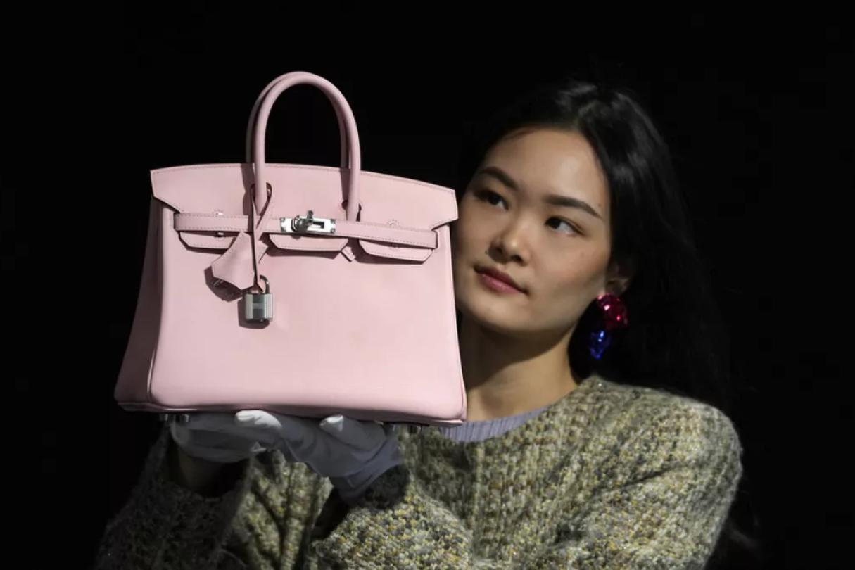Feature image of China Spills Tea on Luxury Goods While Offering Visa-Free Shopping Tours