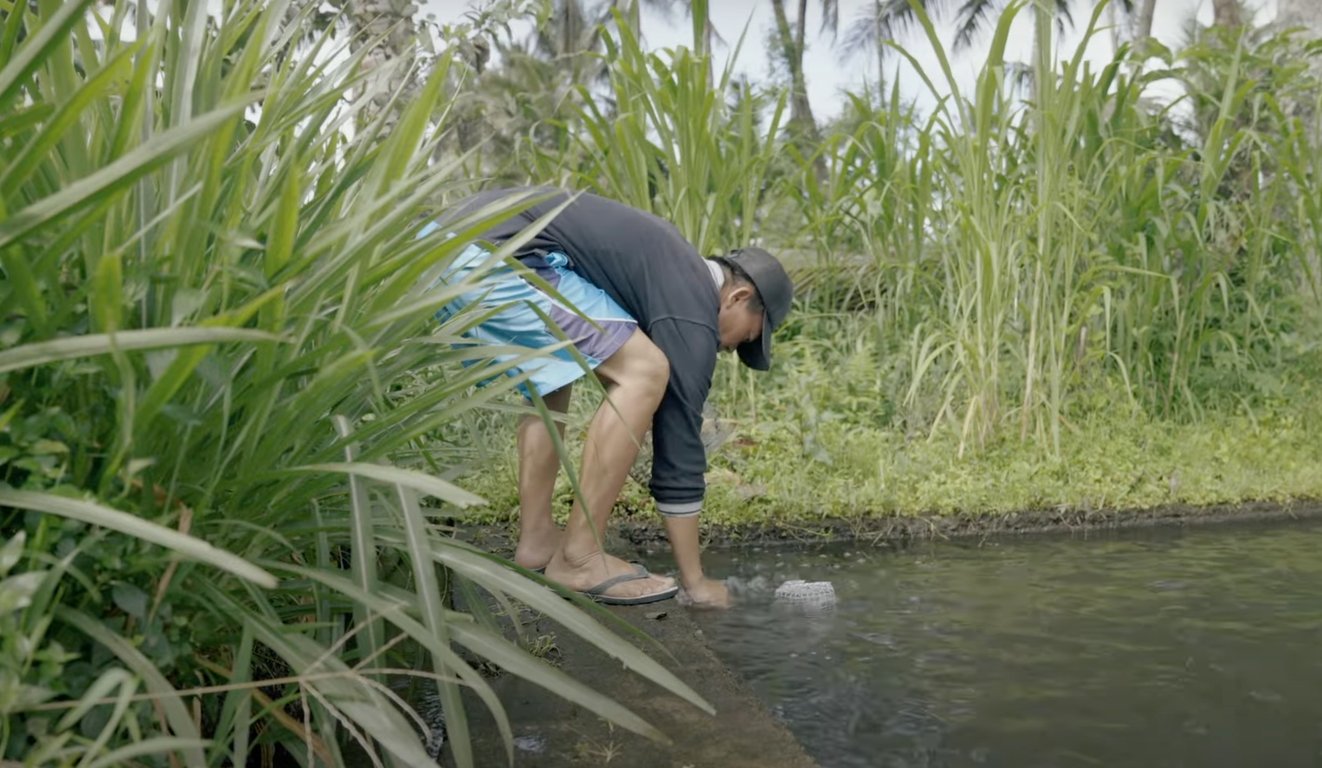 a fish farmer in indonesia