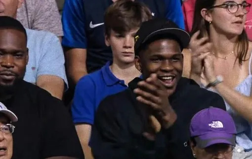 Anthony Edwards cheering for Lily Zhang.