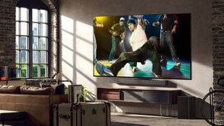 Televizor LG G3 OLED într-un living modern cu dansatori pe ecran
