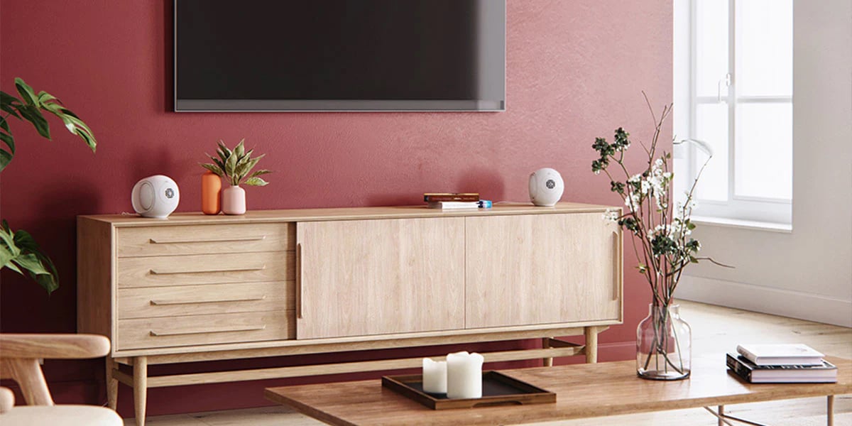White Devialet Phantom speakers in a living room