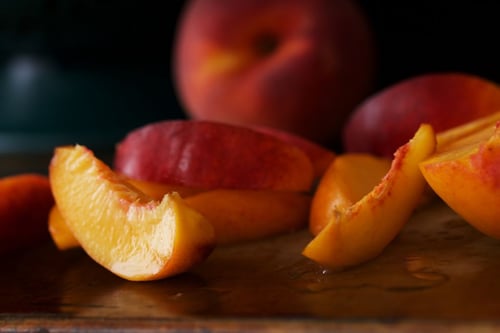 a peach slices on a table
