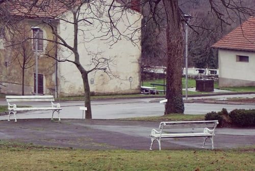 a group of benches in a park