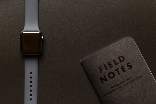 a watch and a note book