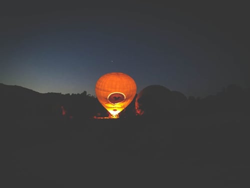 hot air balloons in the dark