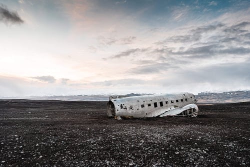 an airplane wreck in a field