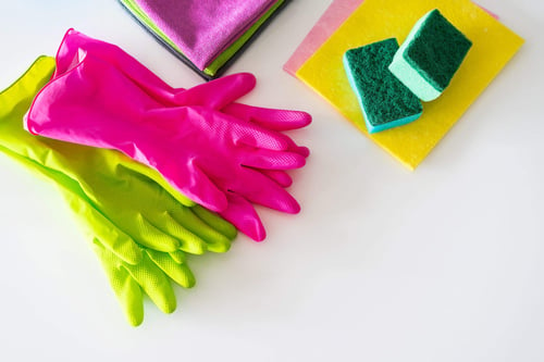 a group of gloves and sponges