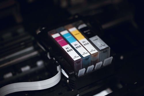 a close up of a printer ink cartridges