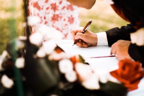 a person signing a document