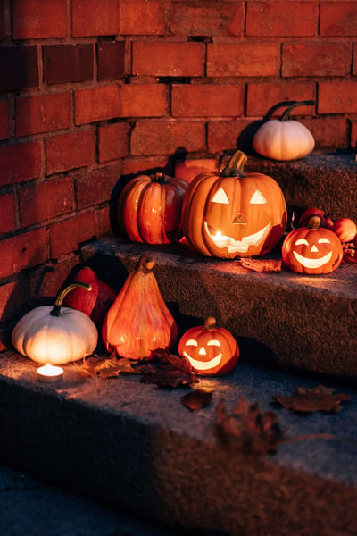 a group of pumpkins on steps