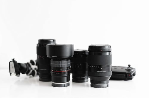 a group of black camera lenses