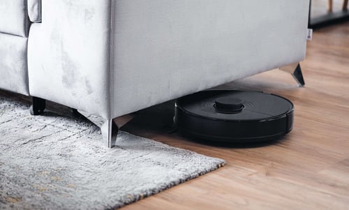 a robot vacuum on the floor