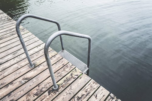 a metal railing on a dock