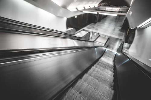 a moving escalator in a building