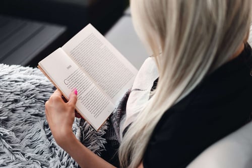 a woman reading a book