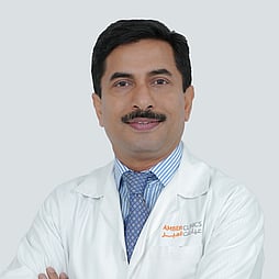 Dr. Alex John