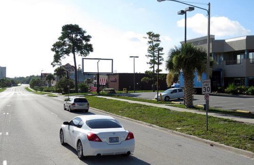 Location photo for Carrier Dr near Dowdy Plaza (Sand Lake)