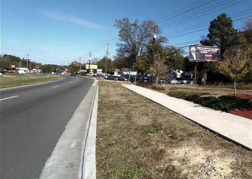 1412 US 501(ROXBORO RD) 200 ft N/O DUKE ST INT. ES Media