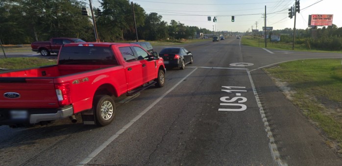 Hwy. 11 120 ft. s/o Highland Parkway WS, S/F Media