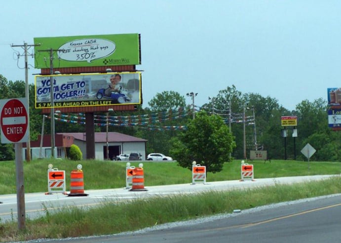 N/S HWY 13, 0.4 MI W/O AIRPORT RD